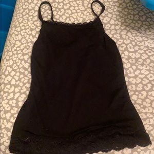 Skin tight slimming under black shirt